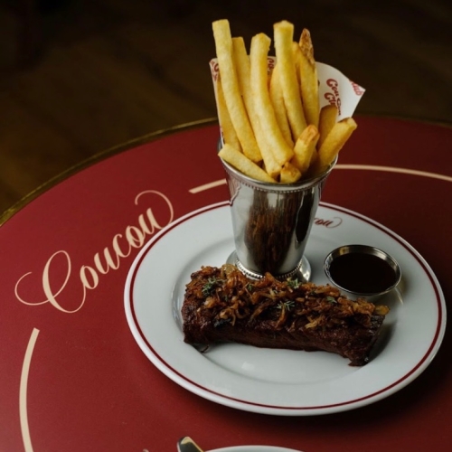 Chef Filiberto@ COU COU Restaurant Steak Frites |&nbsp;prime&nbsp;hanger steak, caramelized shallots, hand-cut chipperbec fries, black garlic jus